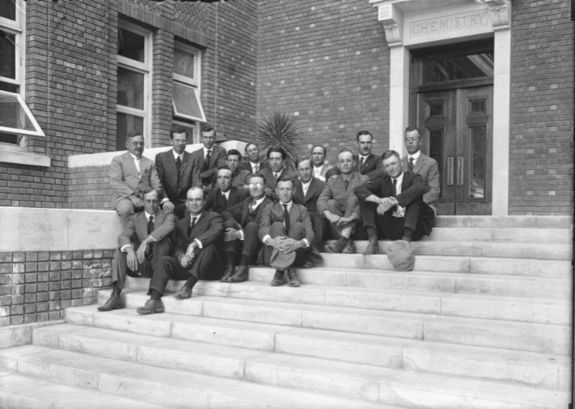 UA Faculty member on the Steps of the Agriculture building