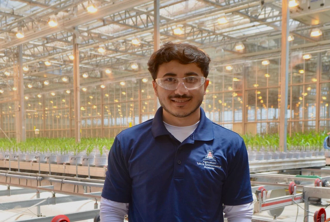 Anvar Sanaev in a greenhouse